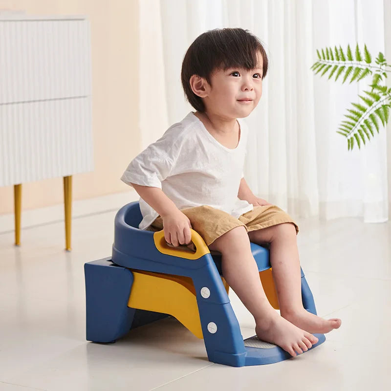 Seggiolino pieghevole per bambini per una facile toilette